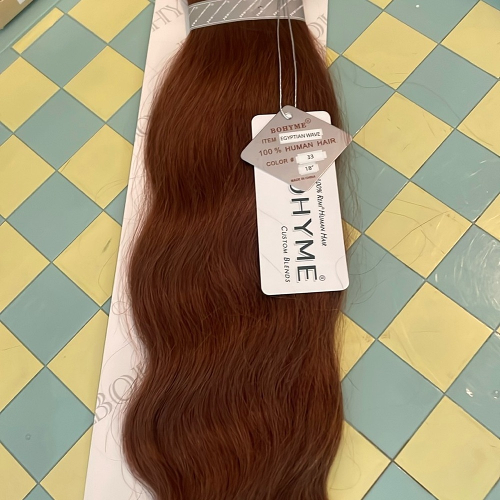 Beautiful human hair Egyptian wave 18” length hair color 33